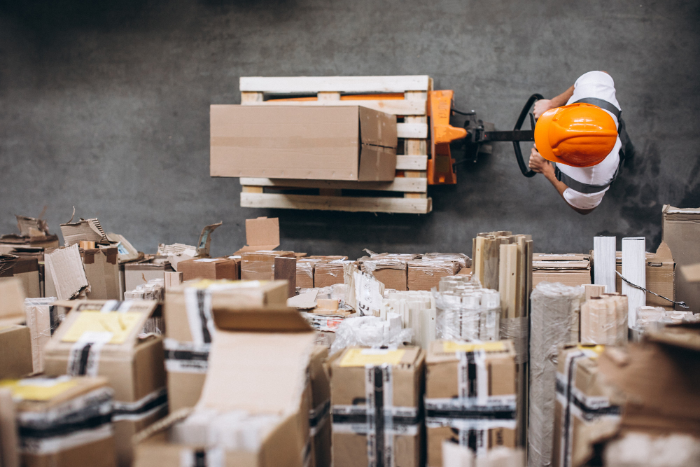 A warehouse image with a man working